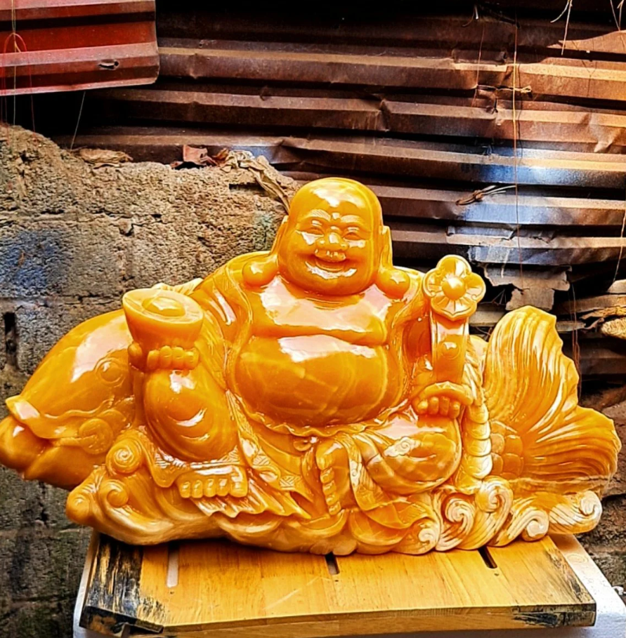 Tượng phật di lặc cưỡi rồng